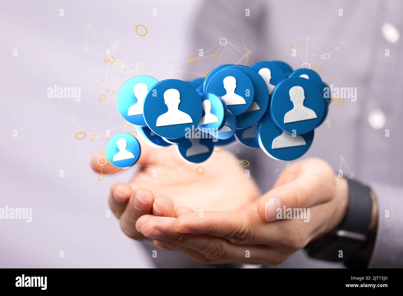 A 3D rendering of floating people icons on a businessman's hand Stock ...