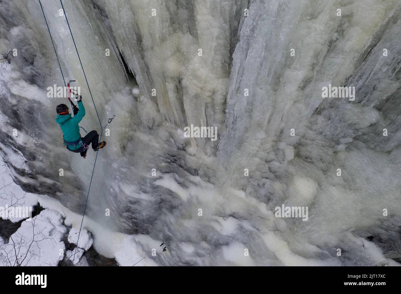 Unidentified personn ice climbing in a icefall in Ushuaia, Tierra del Fuego - Argentina Stock Photo