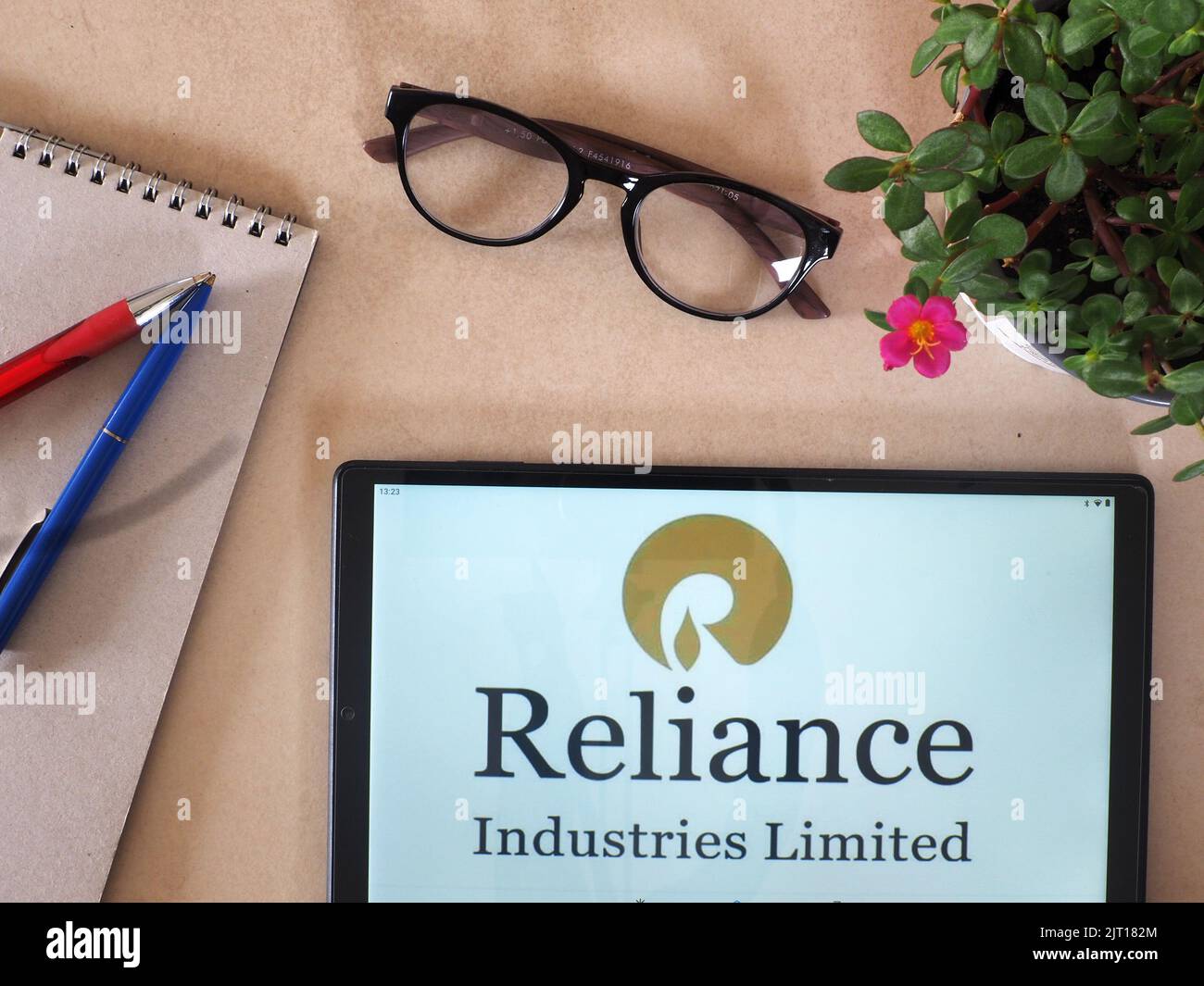 In this photo illustration,  Reliance Industries Limited logo seen displayed on a tablet Stock Photo
