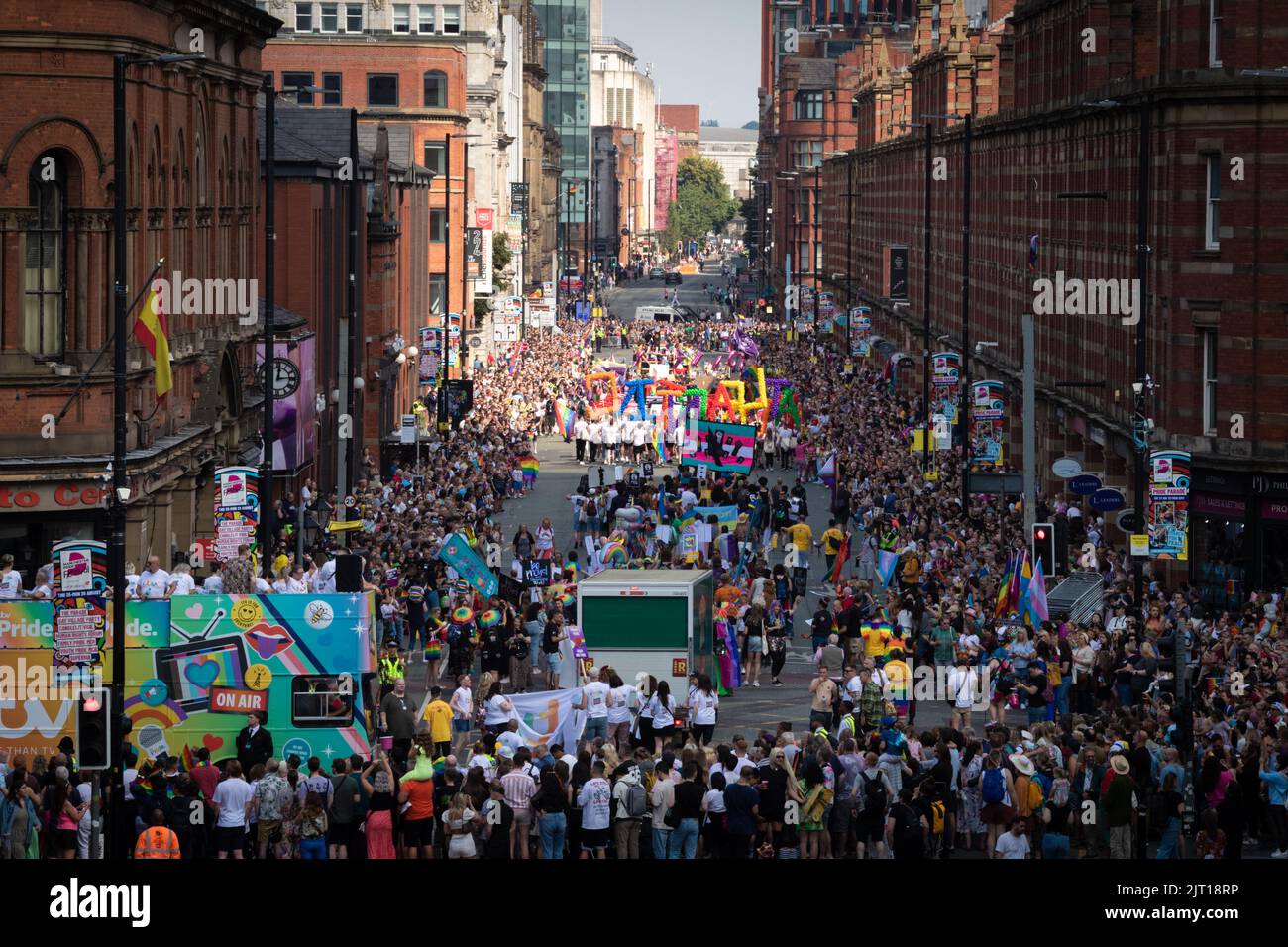 Manchester, UK. 27th Aug, 2022. Thousands of people line the streets to watch the Pride Parade. This year sees the parade come back at full capacity for the first time since 2019. Credit: Andy Barton/Alamy Live News Stock Photo