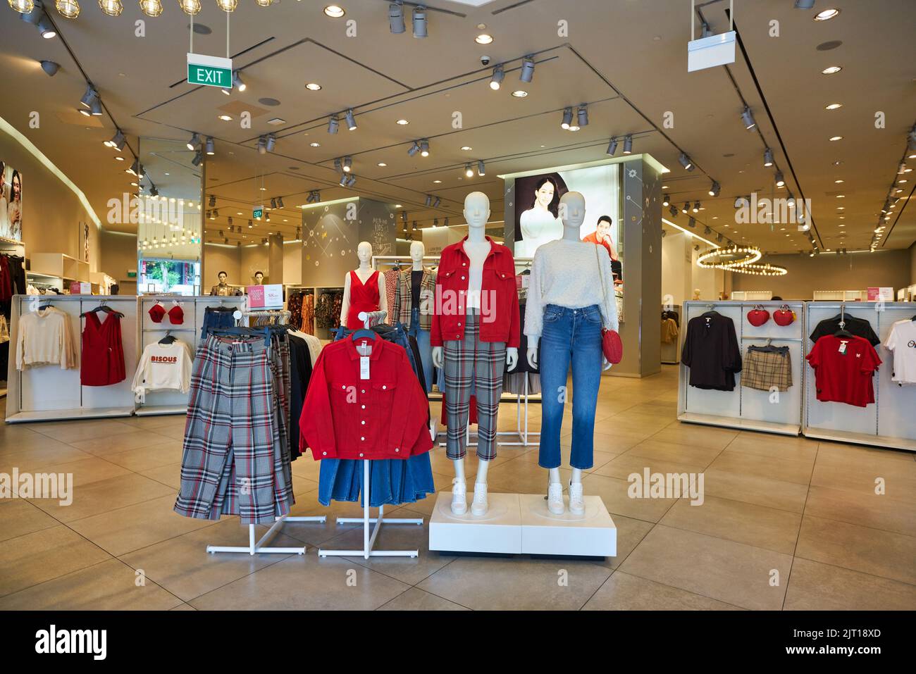 SINGAPORE - JANUARY 19, 2020: interior shot of H&M store in Singapore. H&M is a Swedish multinational clothing-retail company known for its fast-fashi Stock Photo