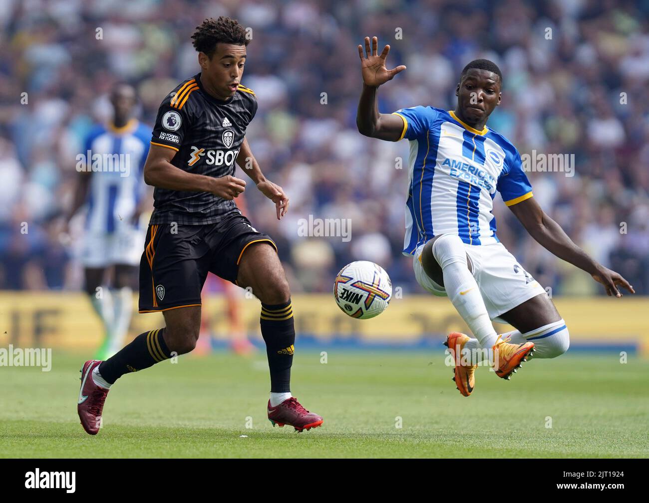 Leeds United's Tyler Adams (left) and Brighton and Hove Albion's Moises