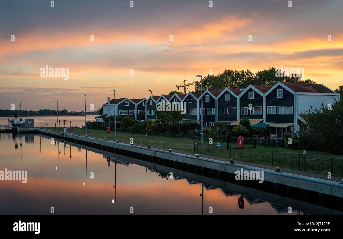 Dutch village Spaarndam in Province North Holland, view of the waterfront by susnet Stock Photo