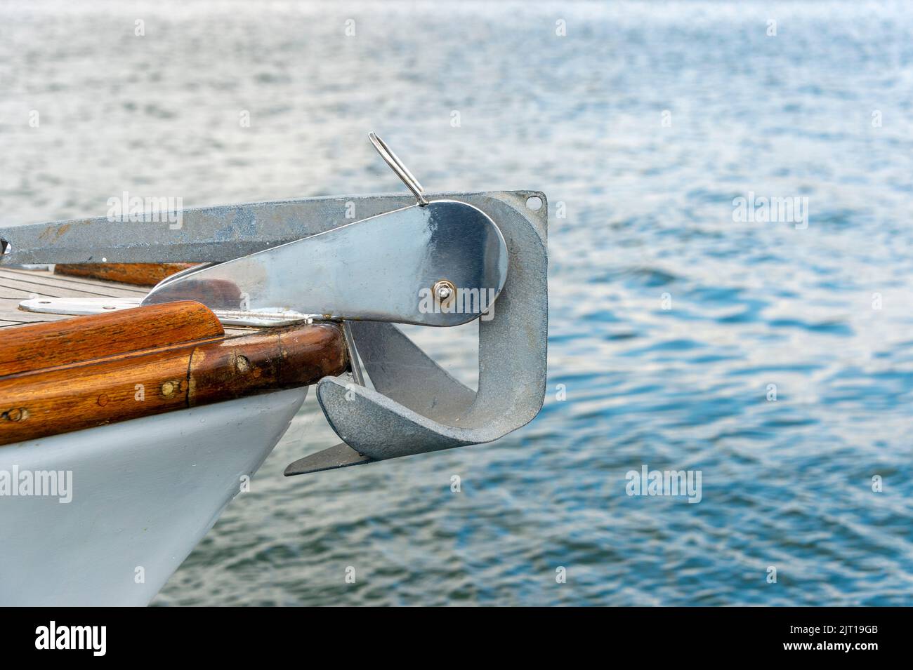 Bow of a sailing boat with an anchor Stock Photo