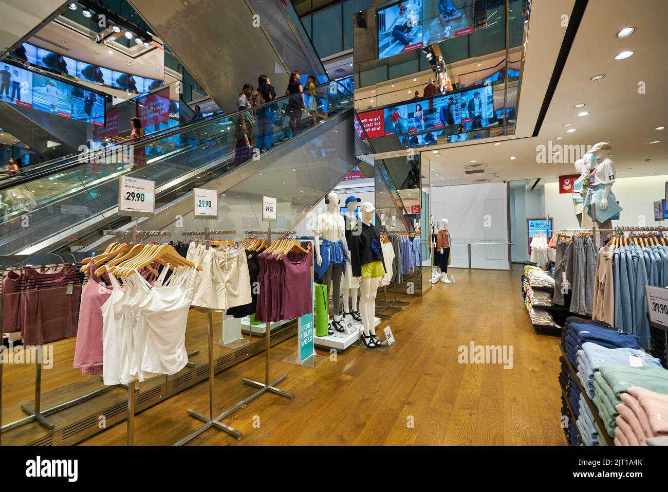 SINGAPORE - CIRCA JANUARY, 2020: interior shot of UNIQLO Orchard Central, Global Flagship Store. The store spans three floors and is located in Orchar Stock Photo
