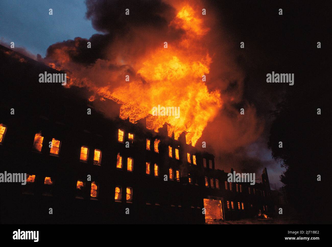 Australia. Sydney. Redfern. Burning industrial warehouse building. Stock Photo