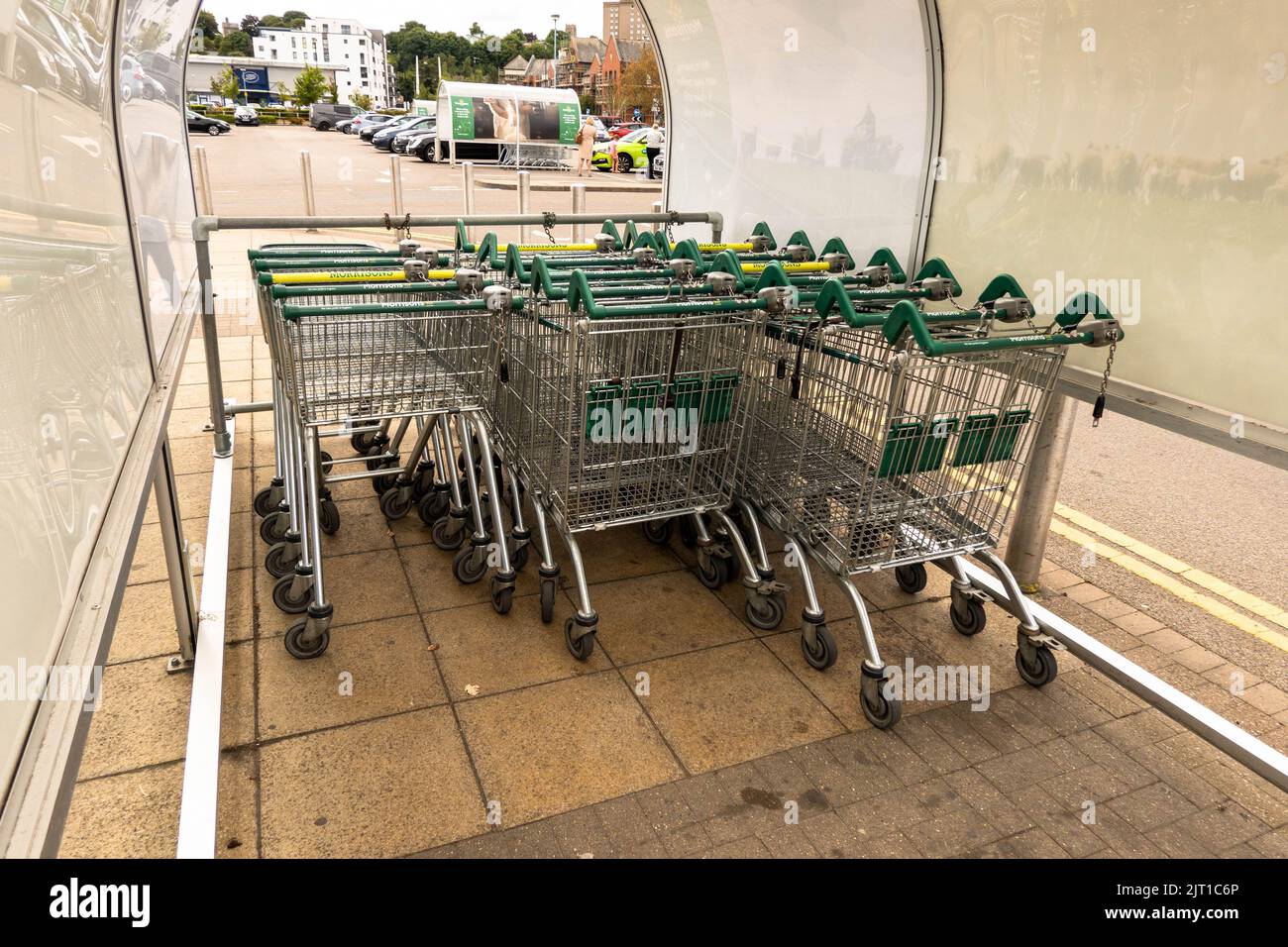 Morrisons supermarket shopping trolleys in a trolley park at Riverside