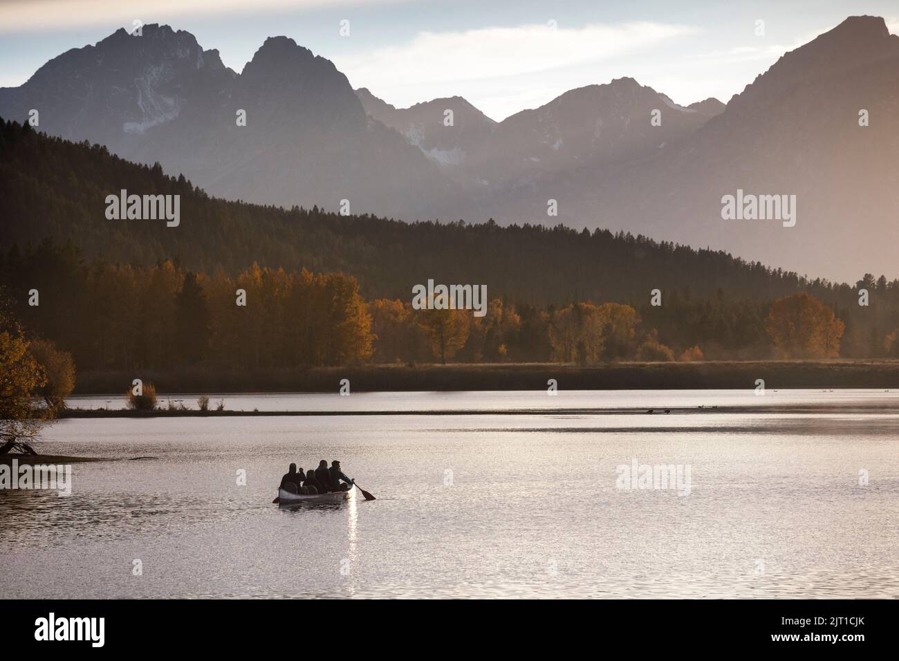 WY04998-00.....WYOMING - Canoe on the Snake River at the Ox Bow in Grand Teton National Park. Stock Photo