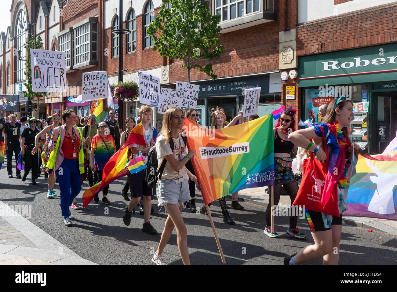 Pride in Surrey parade in Camberley Town on 27th August 2022, Surrey, England, UK. People in colourful costumes march for LGBTQ+ rights. Stock Photo