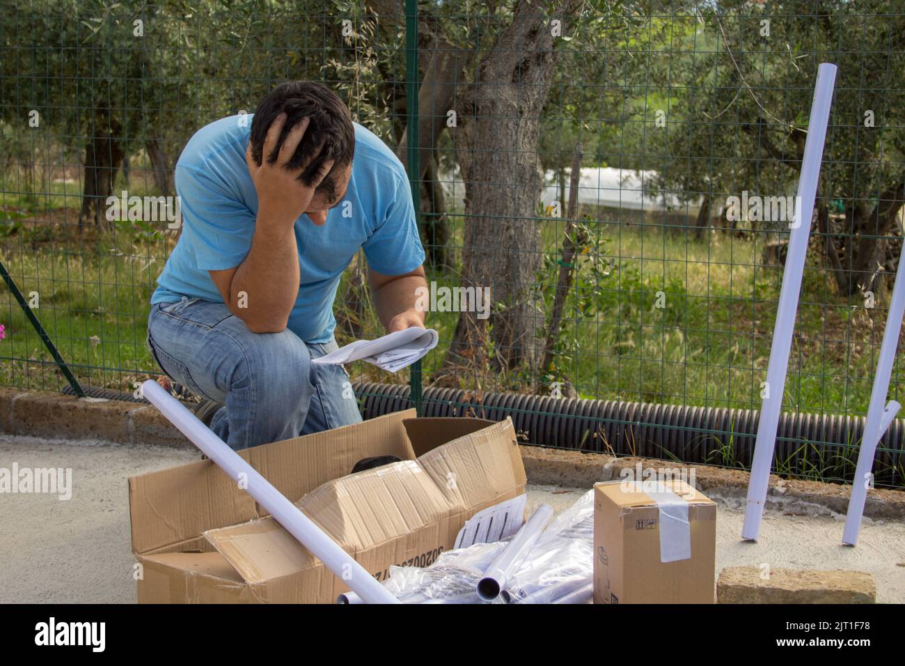 Assembling hand hi-res stock photography and images - Alamy