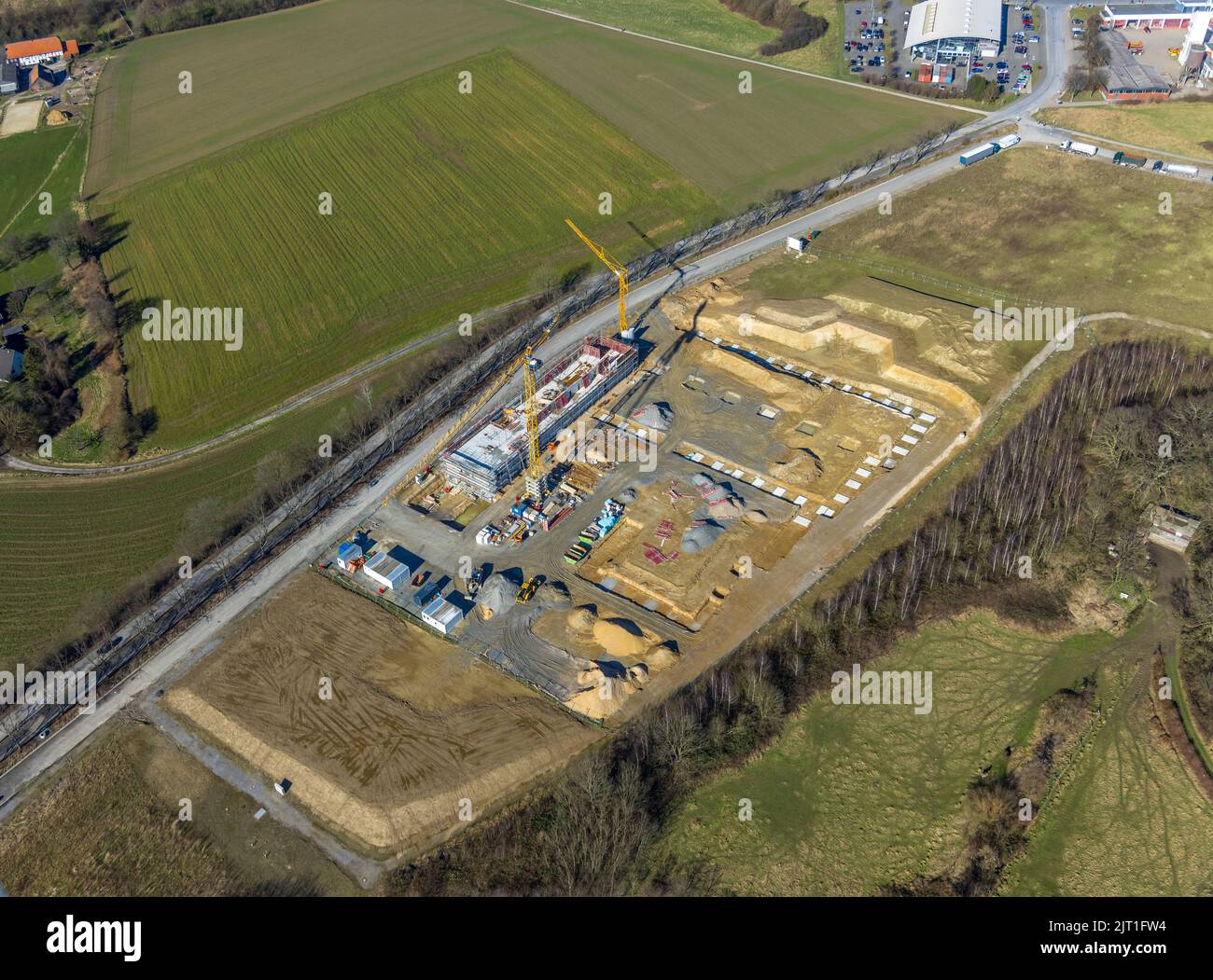 Aerial view, construction site and new building industrial park