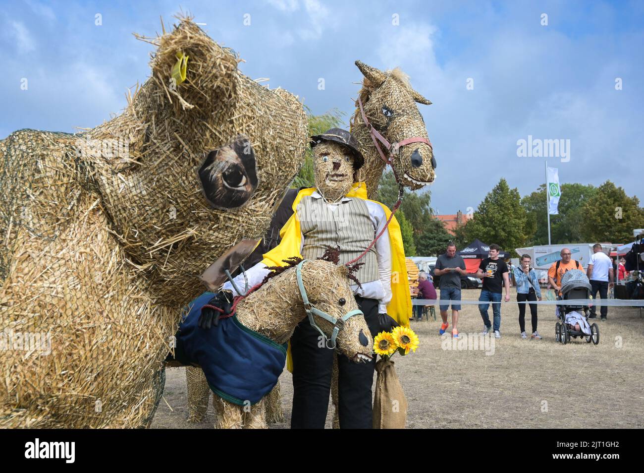 Bernburg, Germany. 27th Aug, 2022. The straw dolls, designed by the