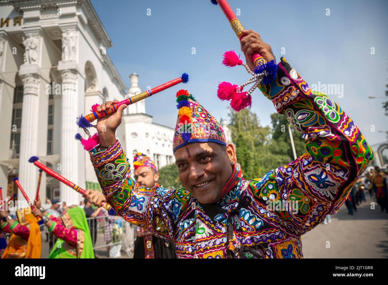 Moscow, Russia. 27th of August, 2022. Members of India's Panghat Performing Arts Group take part in the Spasskaya Tower 2022 International Military Music Festival parade in the VDNKh Exhibition Centre in Moscow, Russia. Nikolay Vinokurov/Alamy Live News Stock Photo