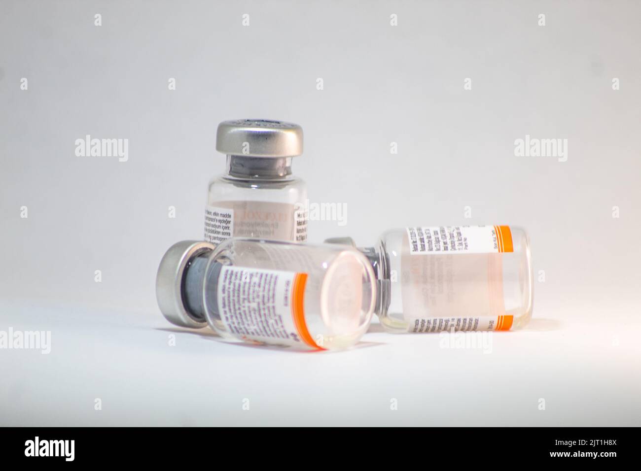 Empty medicine ampoules, vials and needles used for medical treatment