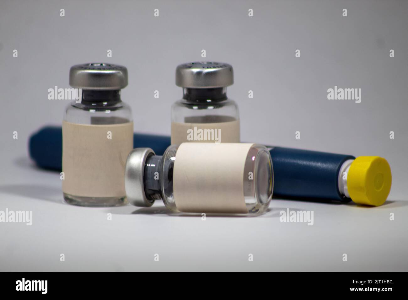 Empty medicine ampoules, vials and needles used for medical treatment