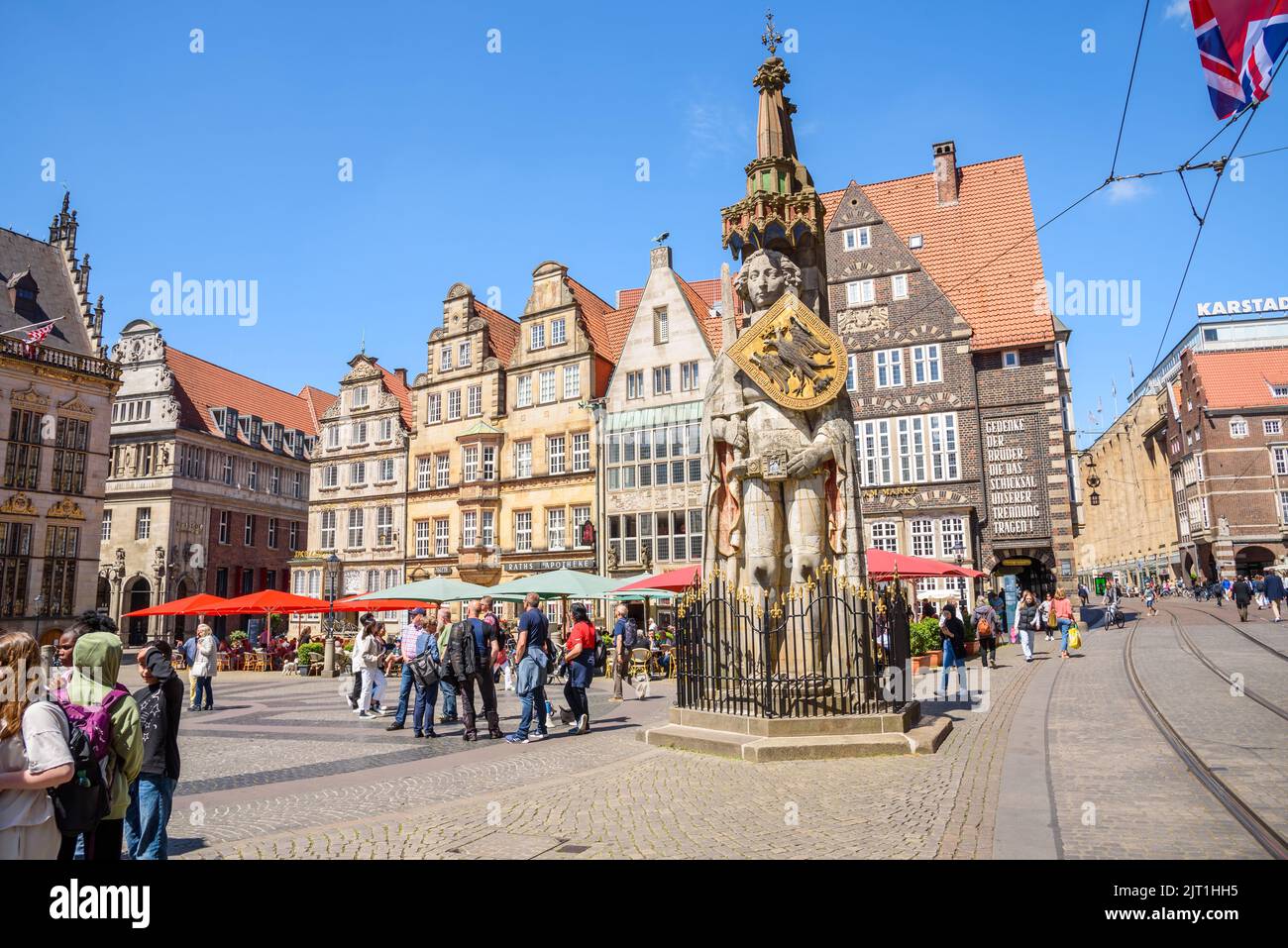 Bremen, Germany - June 21, 2022: Roland statue in Market square on a sunny day. The stone statue, erected in 1404, symbolised the freedom and independ Stock Photo