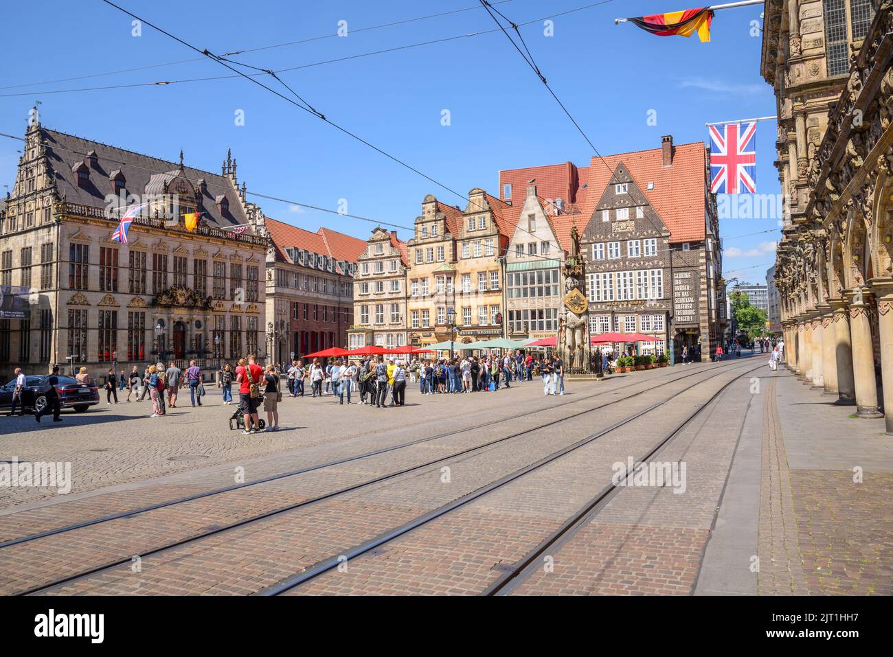 Bremen, Germany - June 21, 2022: View of Market Square crowded with locals and tourists on a sunny morning. Market square is a beautiful historic mark Stock Photo