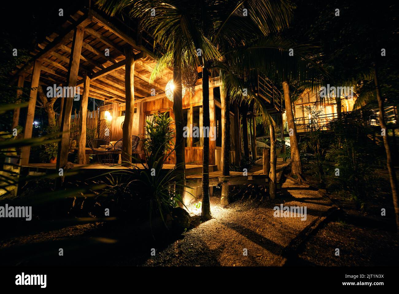 A cozy wooden building with lights in Bacalar, Quintana Roo, Mexico, at
