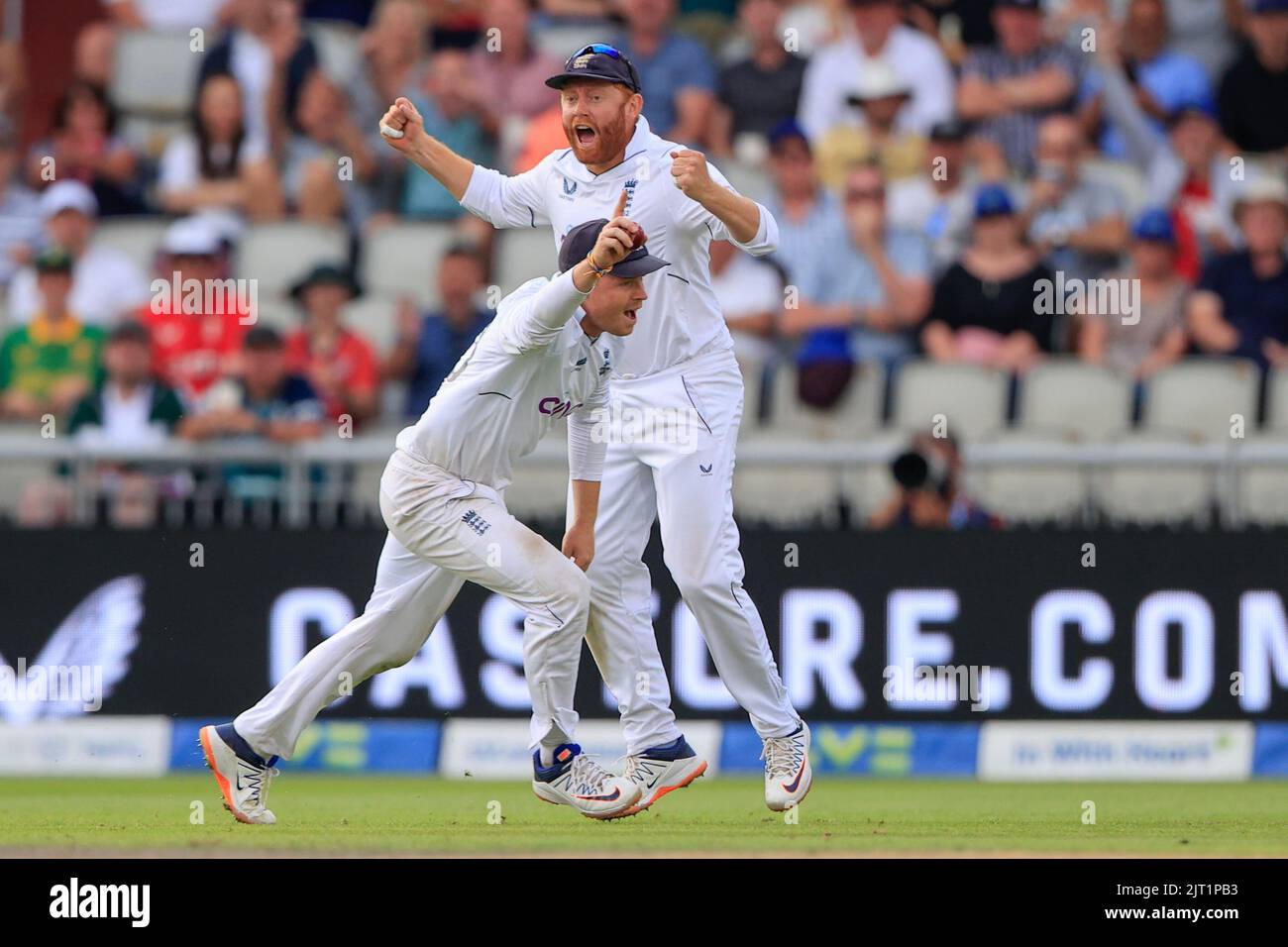 Ollie Pope of England takes the catch to dismiss Keshav Maharaj of