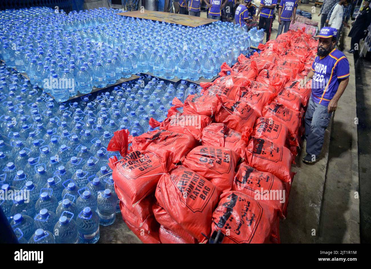 Volunteers are busy in packing of relief goods during food aids for