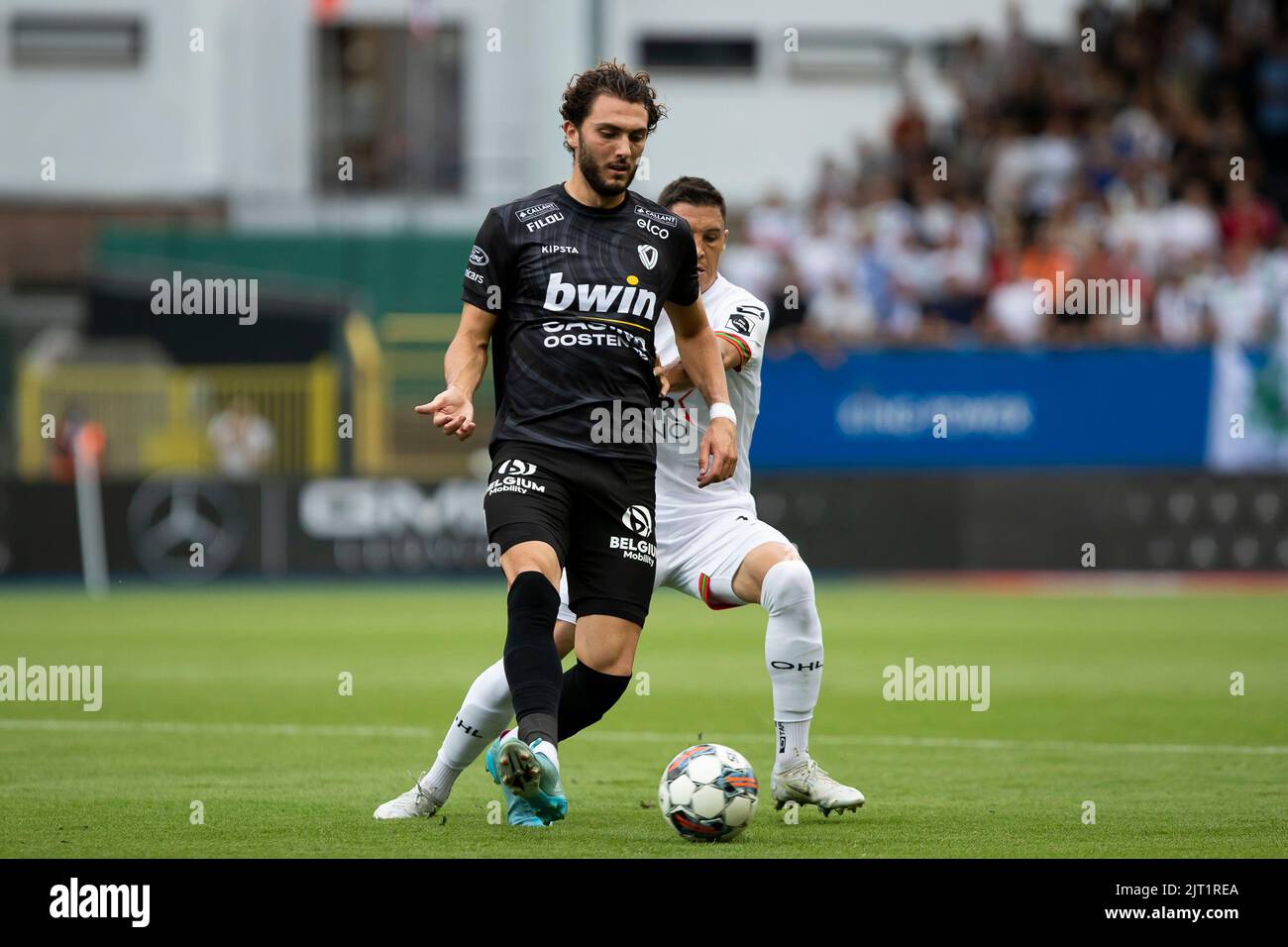 Oostende's Frasser Hornby and OHL's Thibaut Vlietinck pictured in