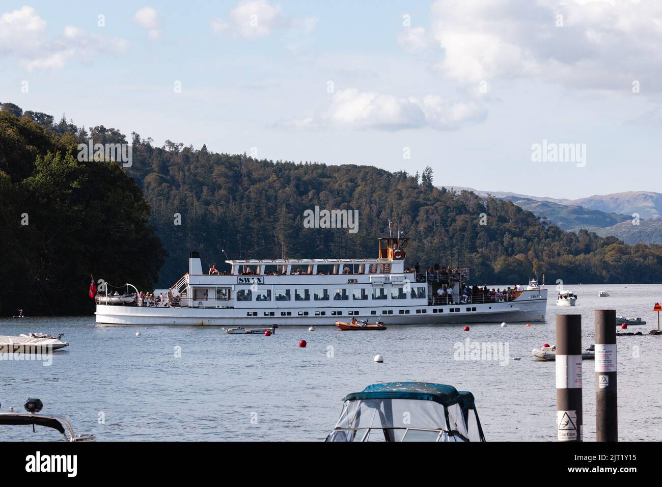 Lake Windermere Cumbria 27th August 2022 .UK Weather Vessels of all sizes & age busy with tourist make the most of the Bank Holiday weekend weather. The Swan  built in 1938 by Vickers of Barrow  Credit: Gordon Shoosmith/Alamy Live News Stock Photo