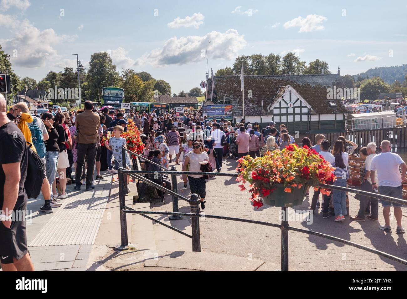 Lake Windermere Cumbria 27th August 2022 .UK Weather Vessels of all sizes & age busy with tourist make the most of the Bank Holiday weekend weather Queue here for 'steamers'. built 1938 Credit: Gordon Shoosmith/Alamy Live News Stock Photo