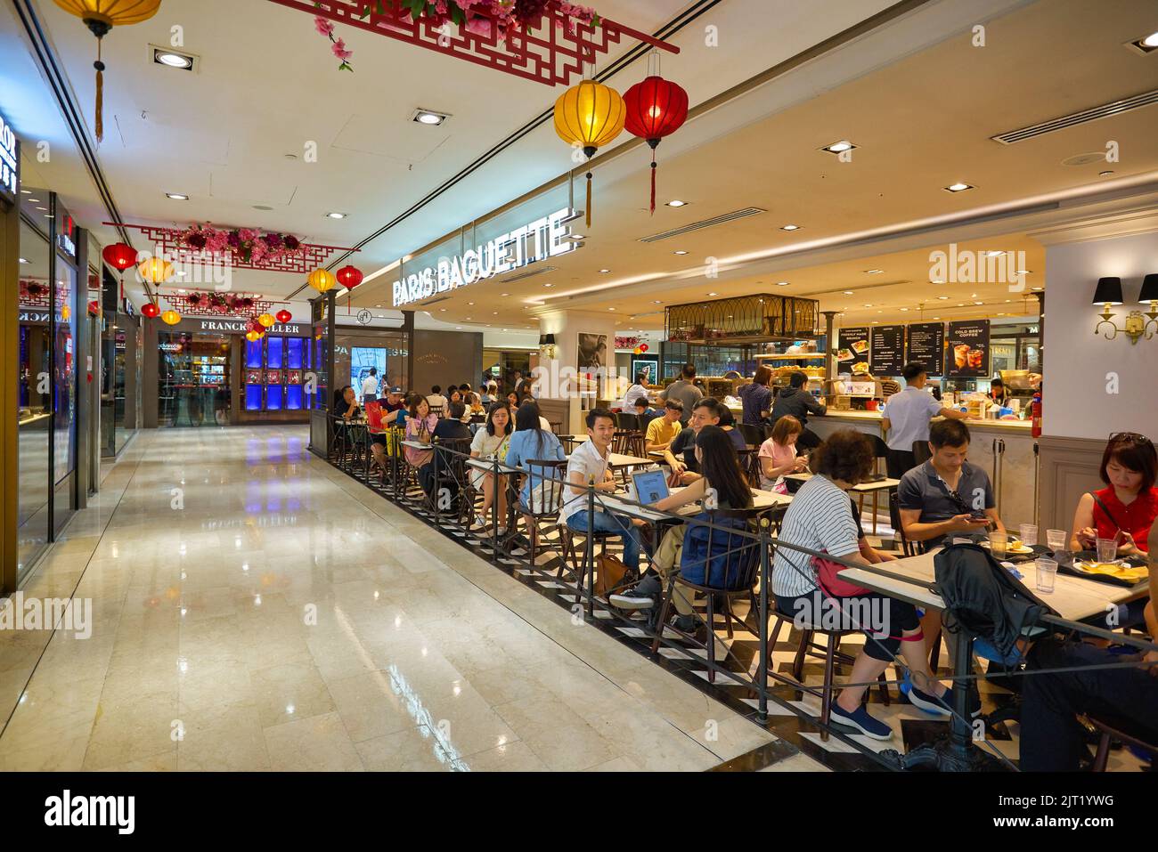 SINGAPORE CIRCA JANUARY, 2020 people are sitting at Frenchinspired