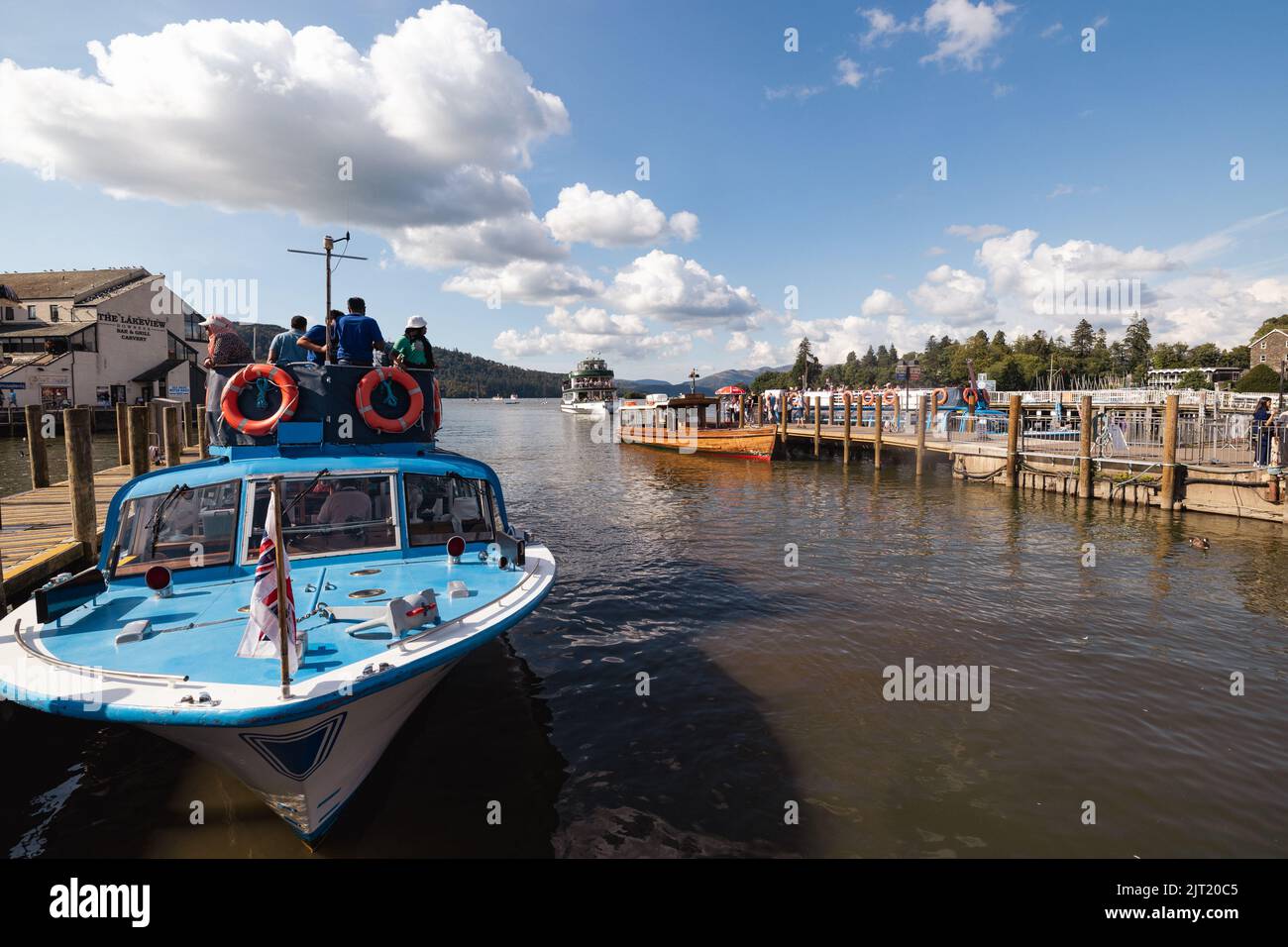 Lake Windermere Cumbria 27th August 2022 .UK Weather Vessels of all sizes & age busy with tourist make the most of the Bank Holiday weekend weather. Credit: Gordon Shoosmith/Alamy Live News Stock Photo
