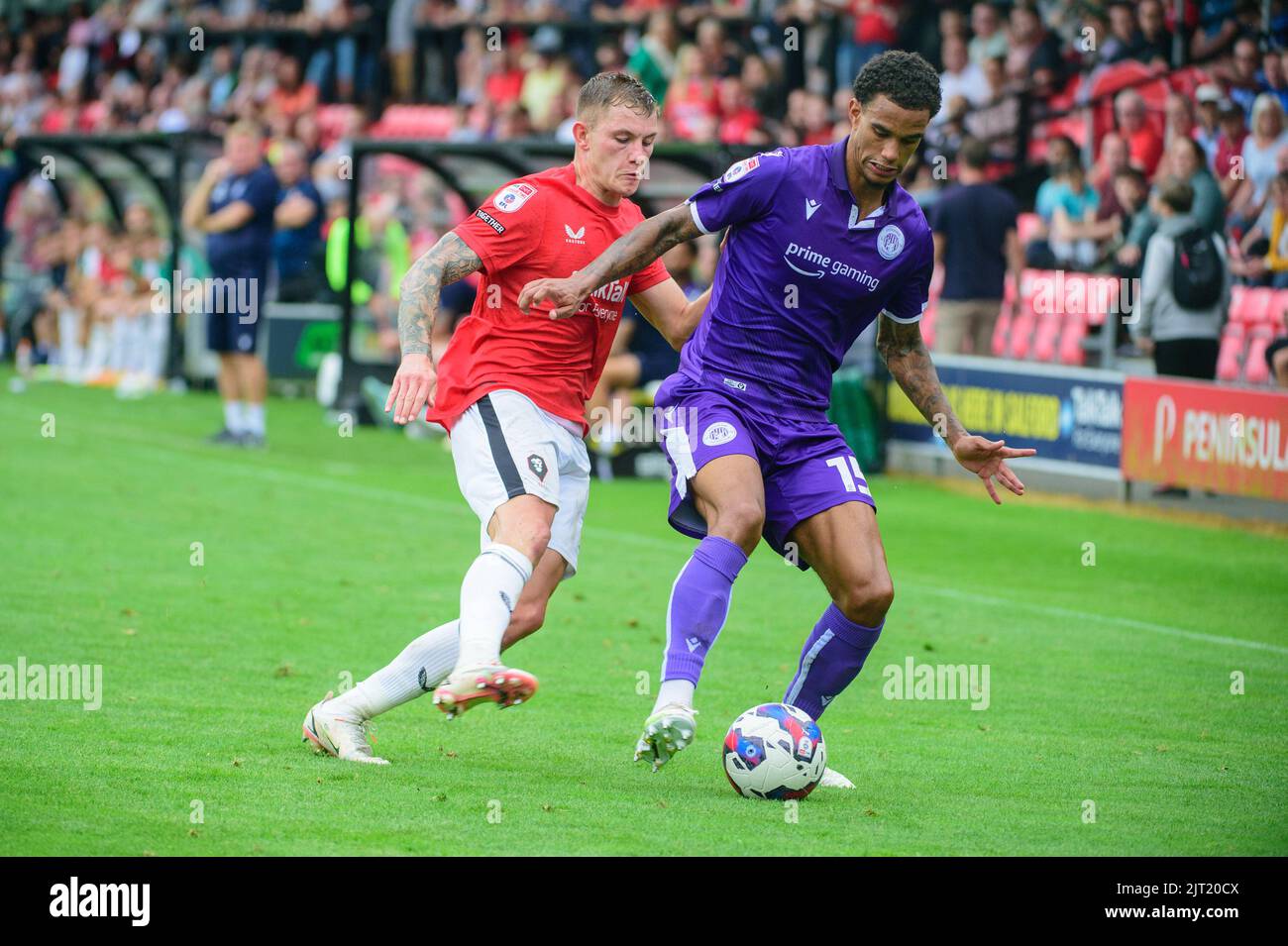 Callum Hendry of Salford City tackles Terence Vancooten of Stevenage FC during the Sky Bet League 2 match between Salford City and Stevenage at Moor Lane, Salford on Saturday 27th August 2022. (Credit: Ian Charles | MI News) Credit: MI News & Sport /Alamy Live News Stock Photo