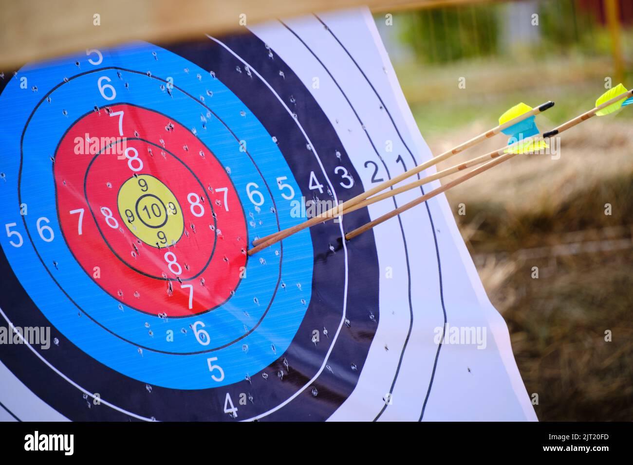 Archery targets with arrows stuck in Stock Photo Alamy