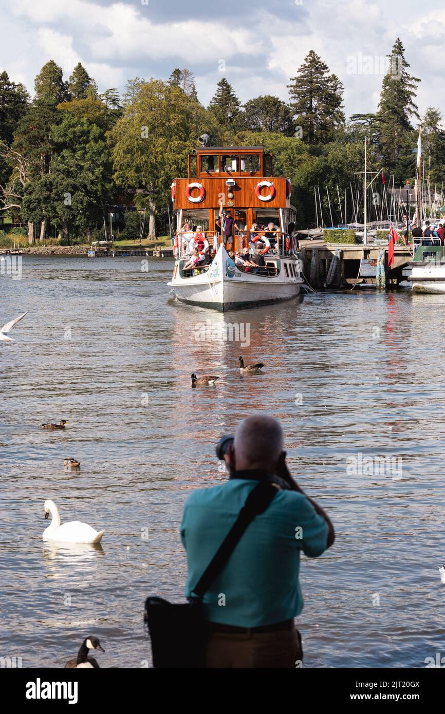 Lake Windermere Cumbria 27th August 2022 .UK Weather Vessels of all sizes & age busy with tourist make the most of the Bank Holiday weekend weather. The MV Tern built 1891   Credit: Gordon Shoosmith/Alamy Live News Stock Photo
