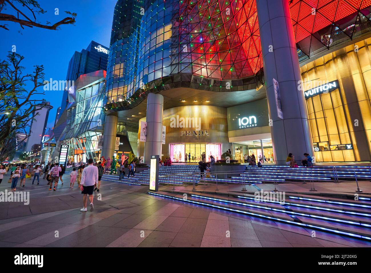 SINGAPORE - CIRCA JANUARY, 2020: street level view of ION Orchard shopping mall in Singapore in the evening. Stock Photo