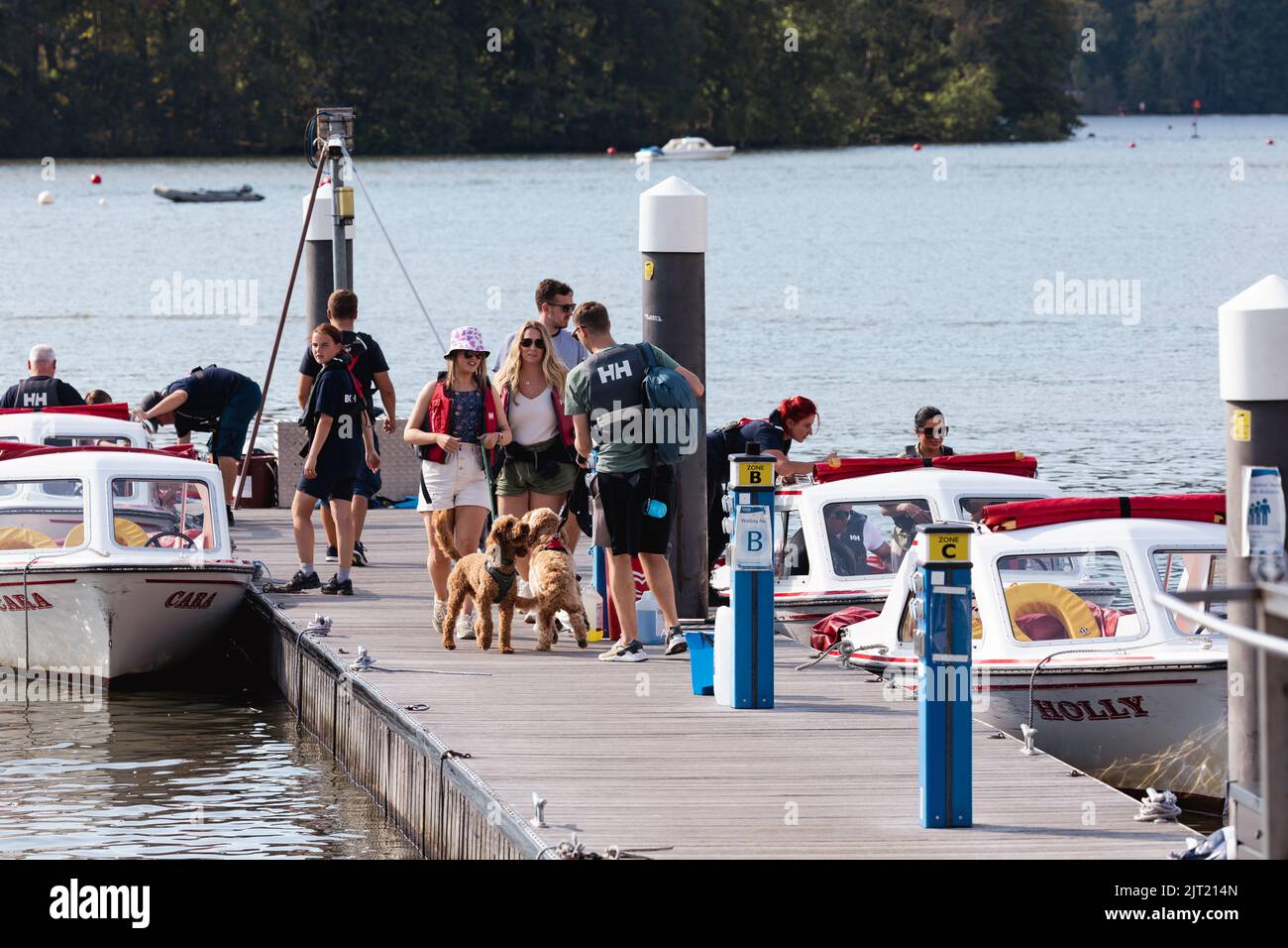 Lake Windermere Cumbria 27th August 2022 .UK Weather Vessels of all sizes & age busy with tourist make the most of the Bank Holiday weekend weather Electric self drive motor boats very popular . Credit: Gordon Shoosmith/Alamy Live News Stock Photo