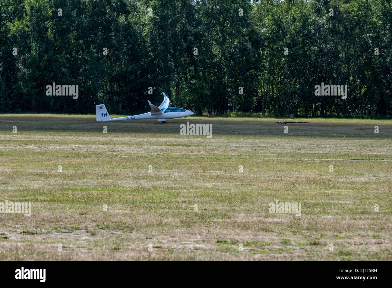 Hamburg, Germany - 08 21 2022: a glider pilot is pulled by a rope for take-off Stock Photo