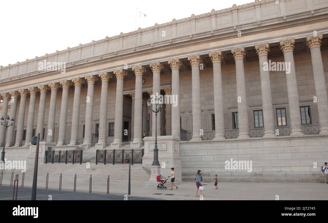Law Courts, Lyon, Rhone, Rhone-Alpes, France.  Large, neo-classical building with a few pedestrians in front. Stock Photo