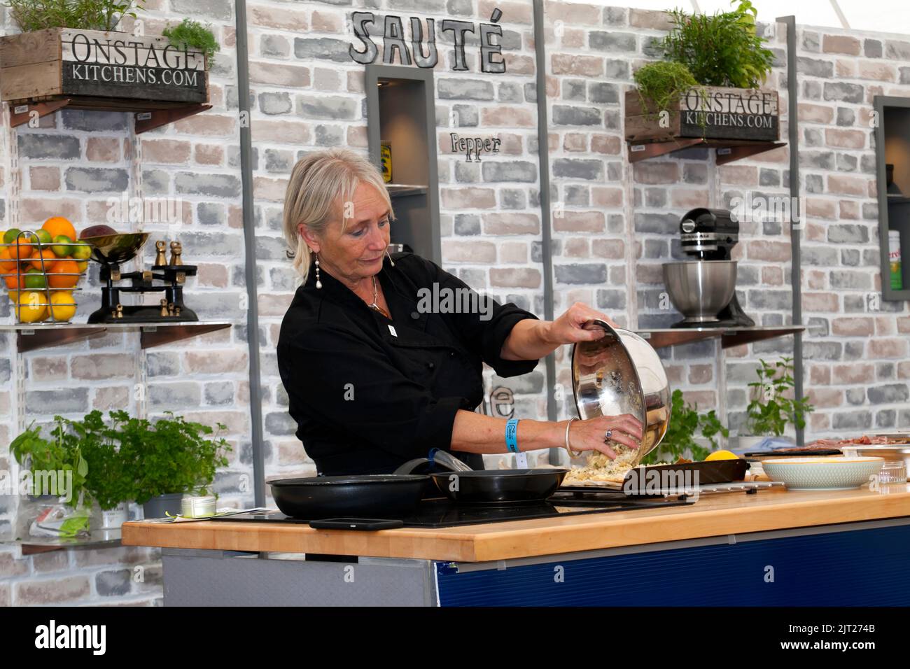 Silverstone Circuit,  Silverstone, Nr, Towcester, 27th August,  2022.  TV chef,  Lesley Waters on stage at Silverstone Kitchen Live. John Gaffen/Alamy Live News Stock Photo