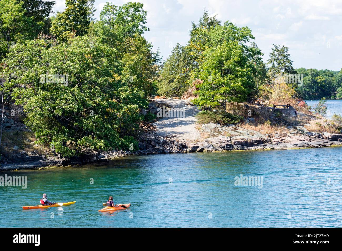 People kayaking in Wanderers Channel, Admiralty group, 1000 one thousand islands, Gananoque, Ontario, Canada Stock Photo