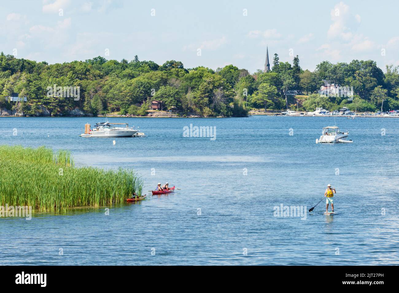 People sailing, kayaking and paddle boarding in Admiralty group, 1000 one thousand islands, Gananoque, Ontario, Canada Stock Photo