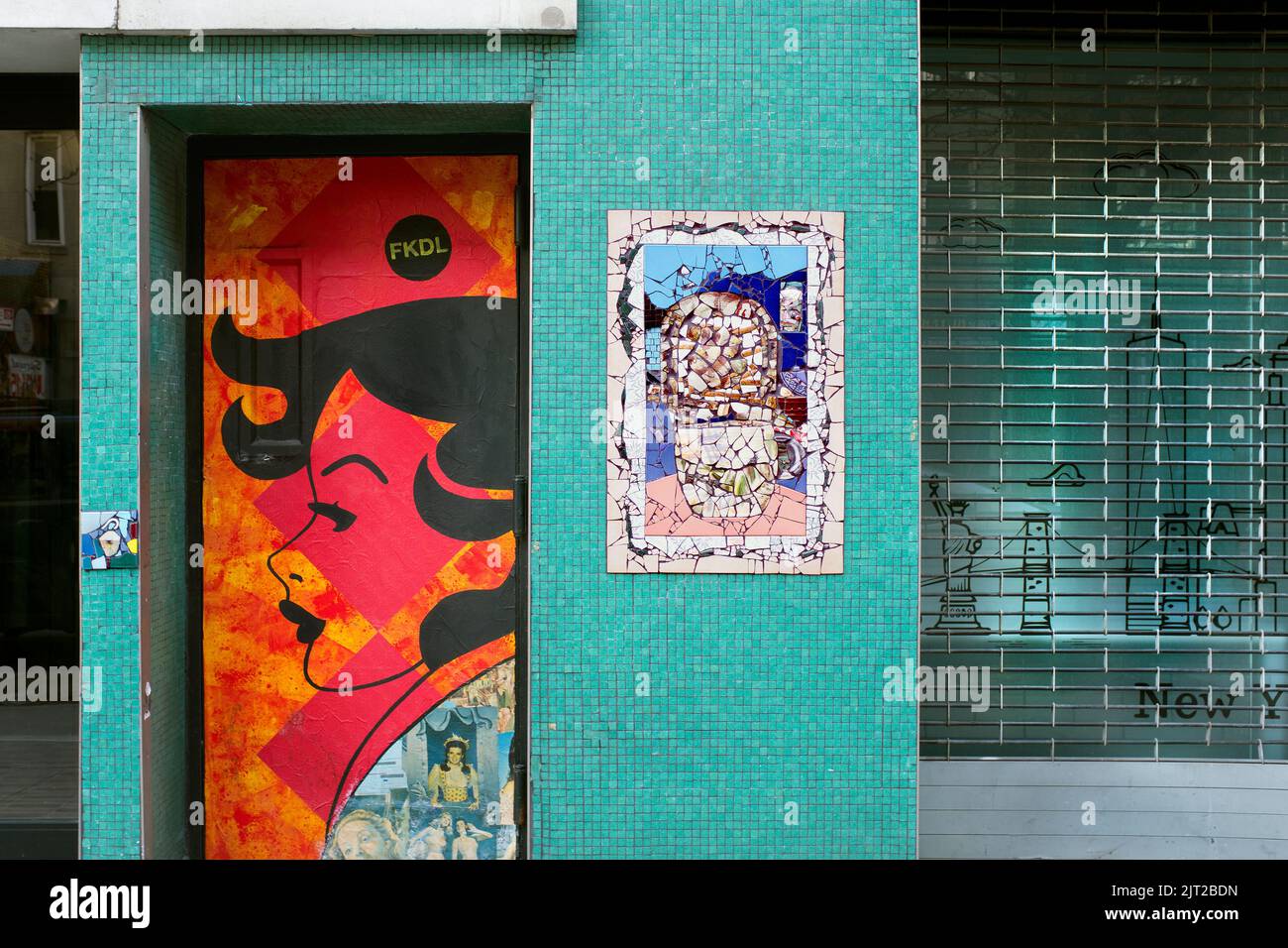 Mosaic on Turquoise Tiles, Public Art on Door, East Third Street, New York City, New York, USA Stock Photo