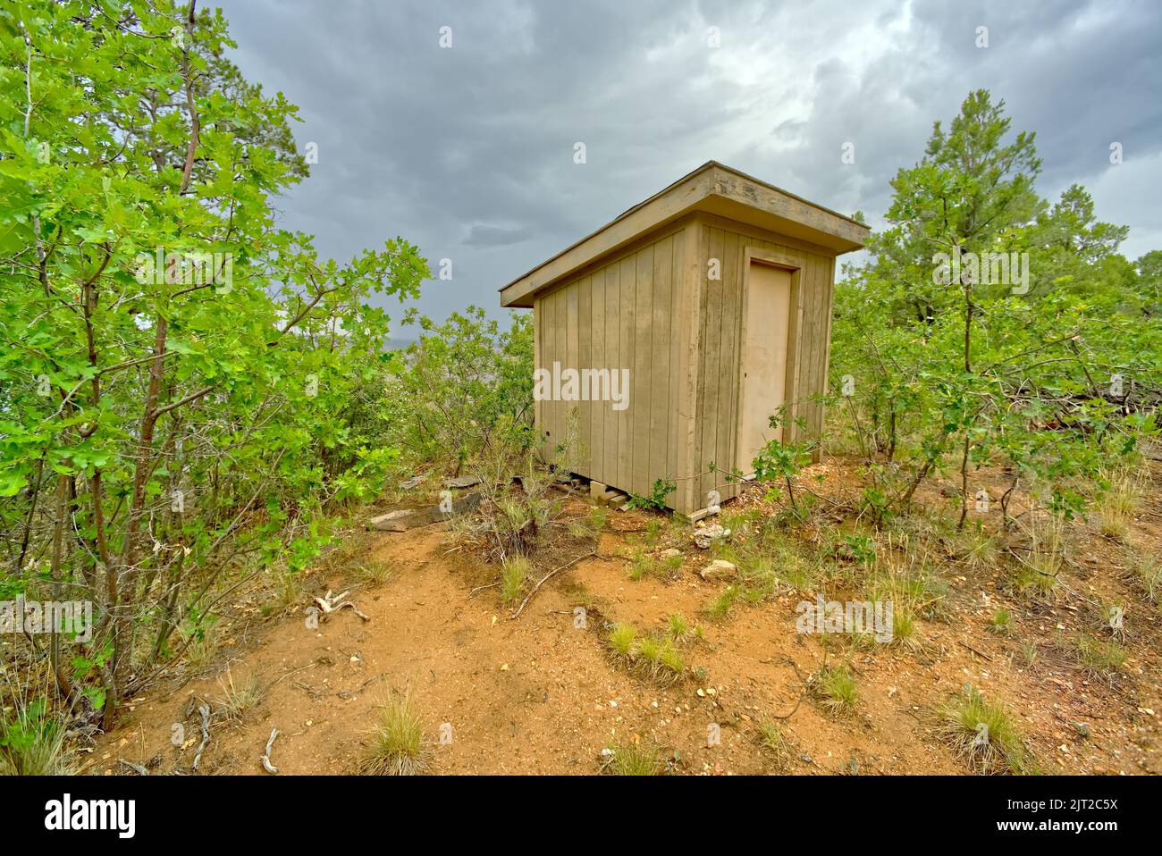 An old storage shed near the rim of Grand Canyon Arizona east of Grandview Point on a rainy day. Stock Photo