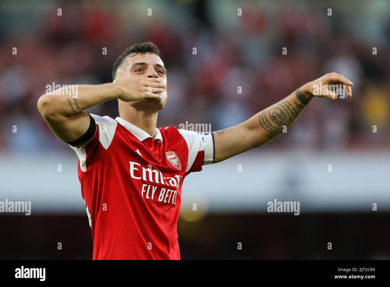 Granit Xhaka #34 of Arsenal blows a kiss into the stands at the
