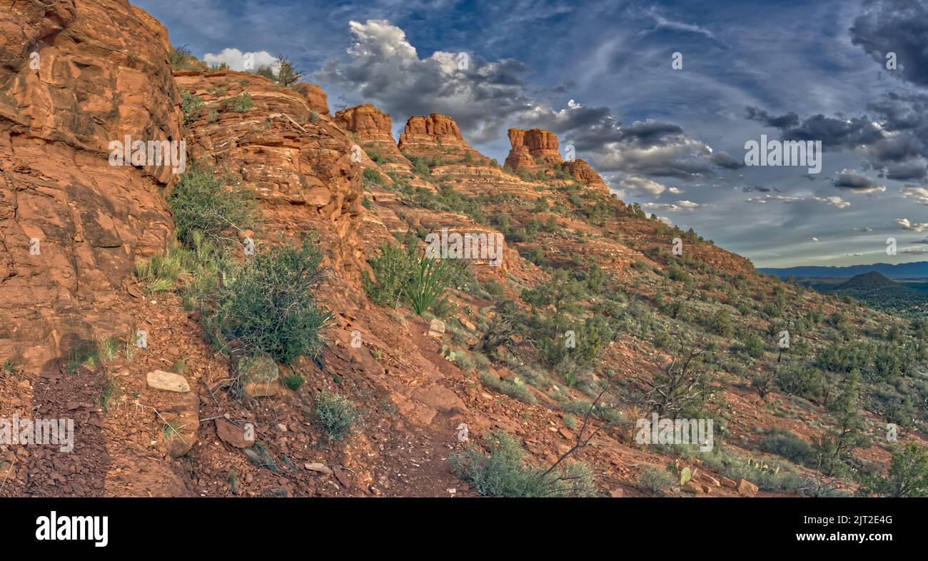The west side of Cockscomb Butte in Sedona Arizona viewed from the Ground Control Trail near sundown. Stock Photo