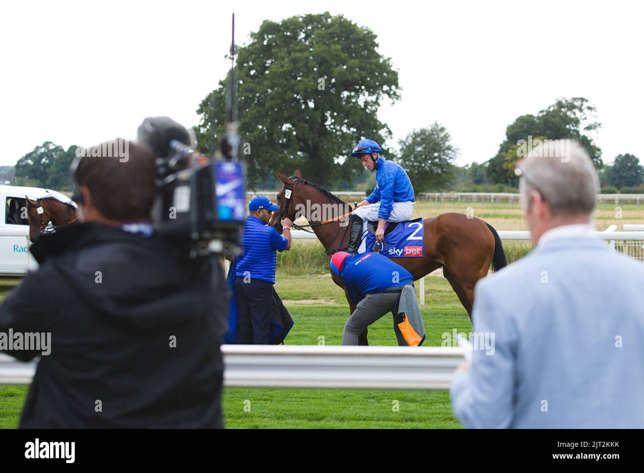 Jockey Ray Dawson riding Mawj getting ready to ride at York Races while ITV's Mick Fitzgerald looks on. Stock Photo