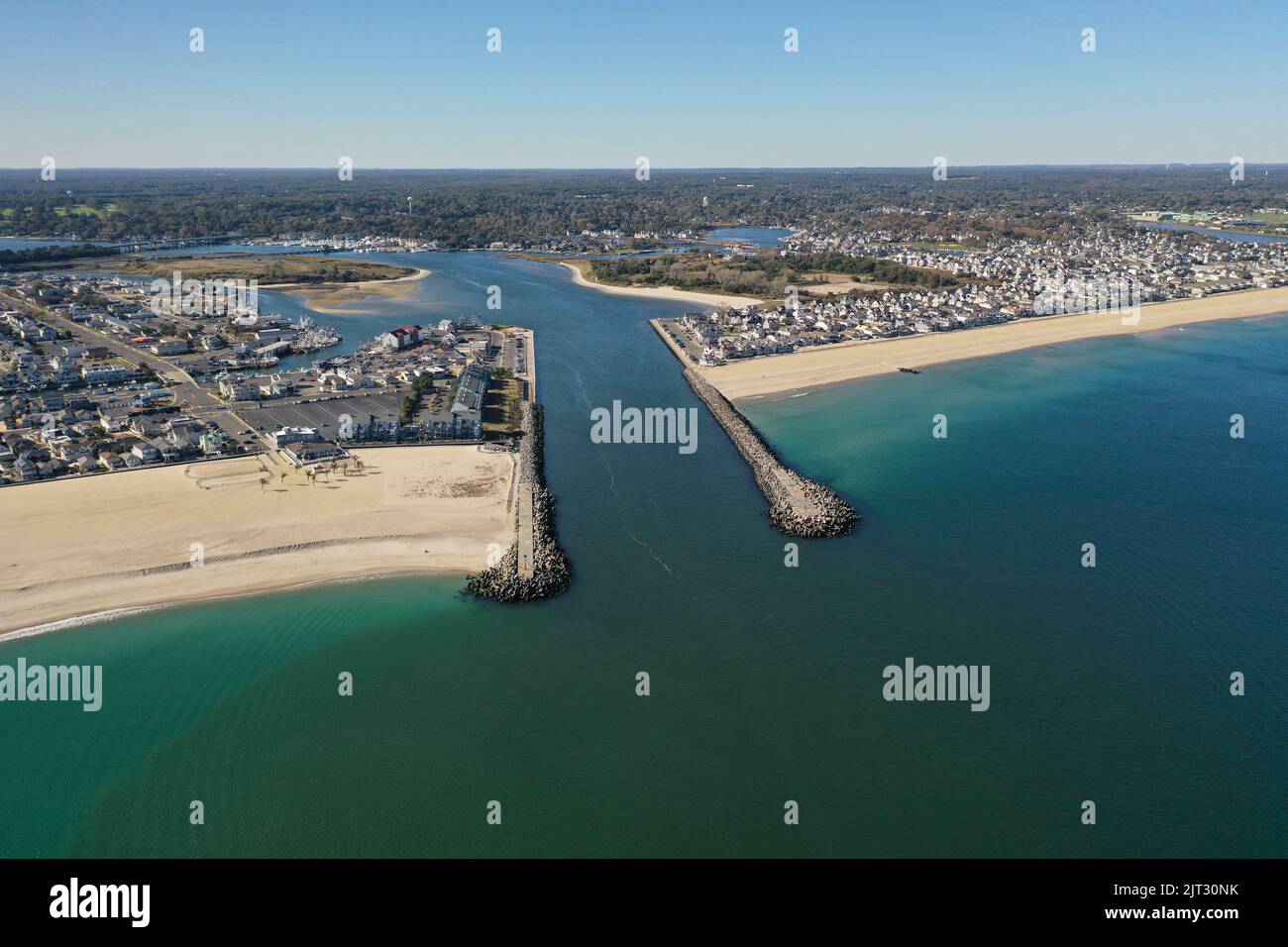 A drone shot of the Manasquan Inlet in New Jersey, on a bright sunny