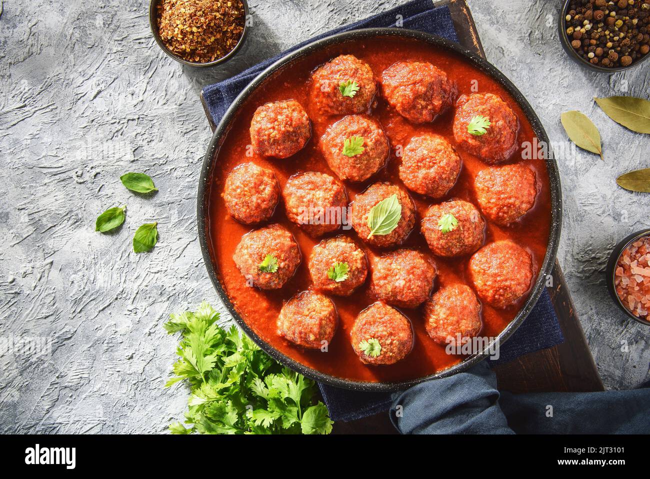 Middle Eastern traditional spiced meatballs in tomato sauce "Dawood