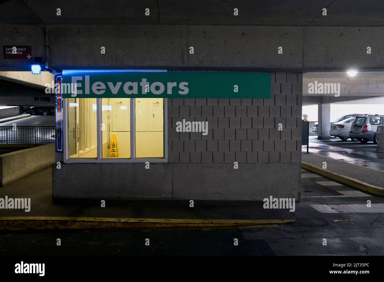 Elevator Entrance in Parking Garage Stock Photo