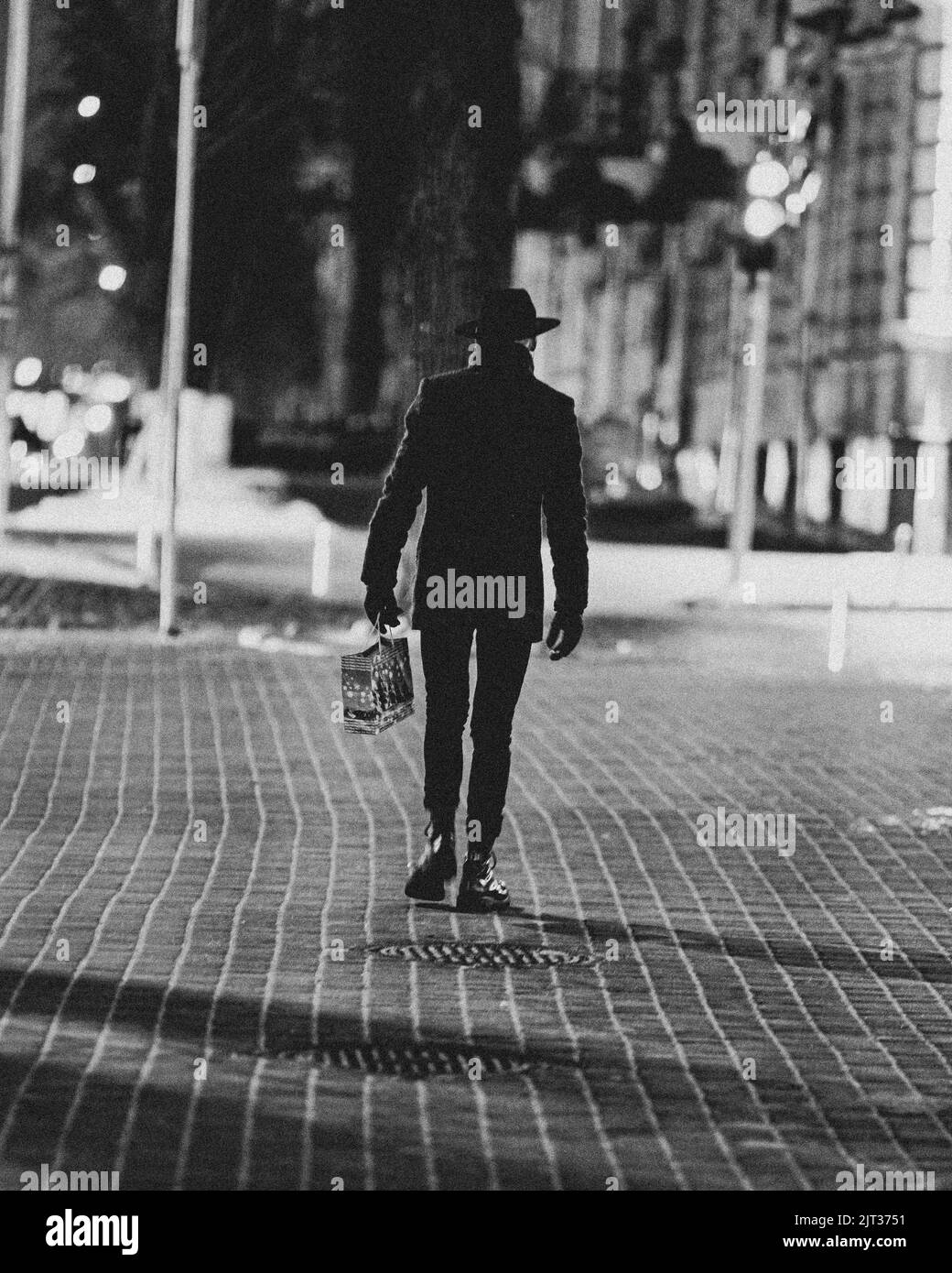 A grayscale shot of a homeless