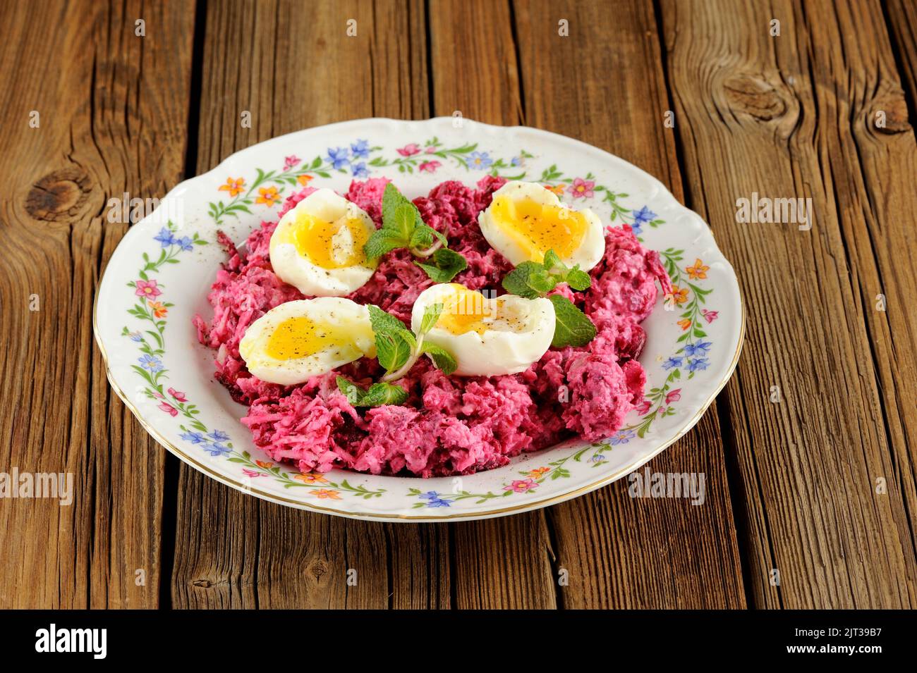Beetroot salad with mint and boiled eggs horizontal Stock Photo Alamy