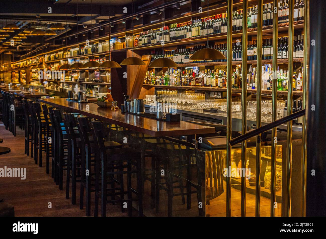 Illuminated interior of a high concept bar, London, England, UK Stock